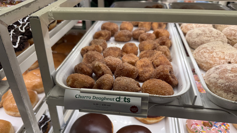 a tray of Krispy Kreme Churro Dot Doughnuts