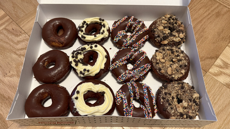 A dozen donuts from the 2026 Chocomania Collection from Krispy Kreme