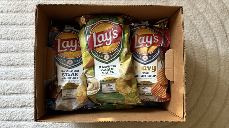 Bags of Lay's World Cup Globally Inspired Flavors in a box