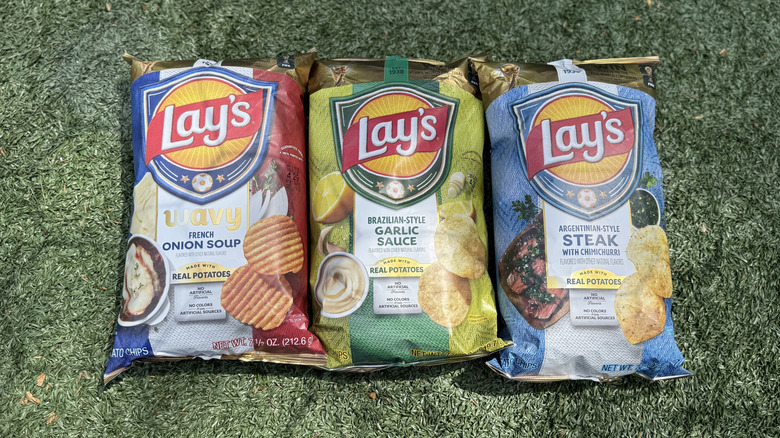 Bags of Lay's World Cup Globally Inspired Flavors on the soccer pitch