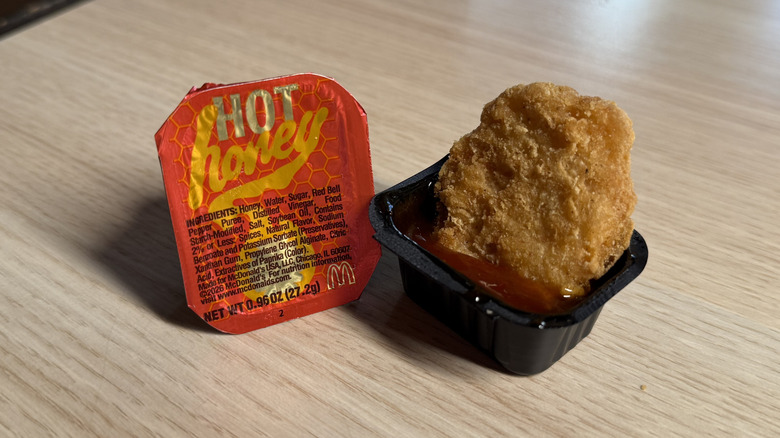 McNugget dipped into the Hot Honey sauce