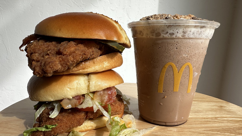 McDonald's Chips Ahoy! Frappe next to stack of buffalo ranch McCrispy sandwiches