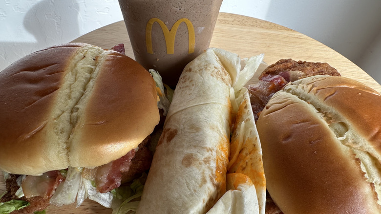 McDonald's Chips Ahoy! Frappe, two buffalo ranch sandwiches, and one buffalo ranch snack wrap on table.