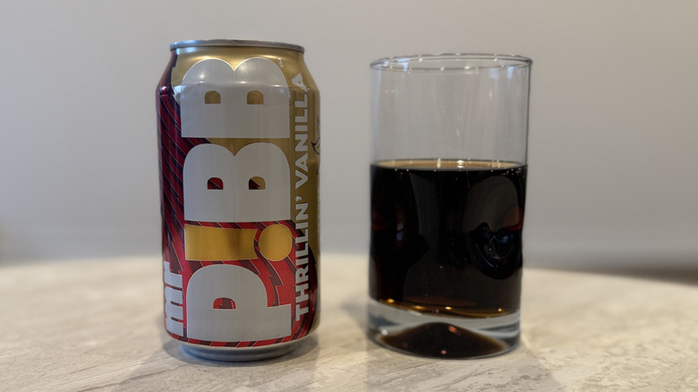 A glass filled with Mr. Pibb Thrillin' Vanilla