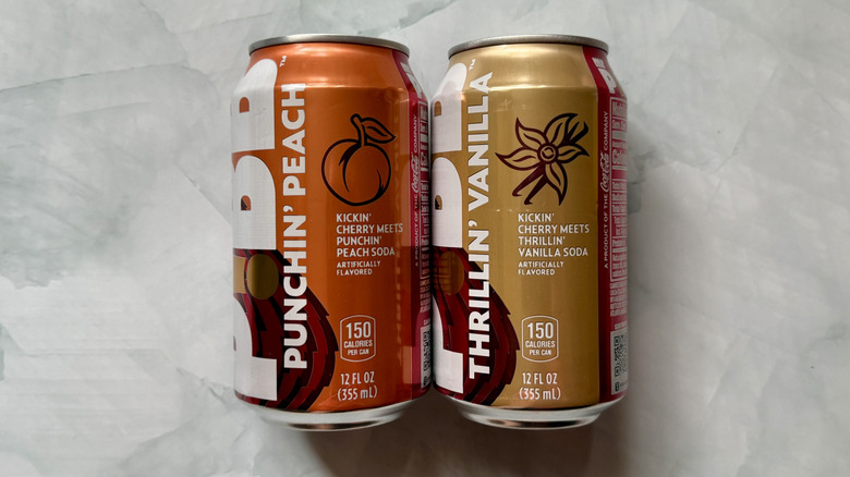 Mr. Pibb Punchin' Peach and Thrillin' Vanilla cans