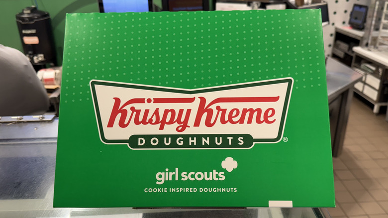 A Krispy Kreme Girl Scout Cookie inspired doughnuts box