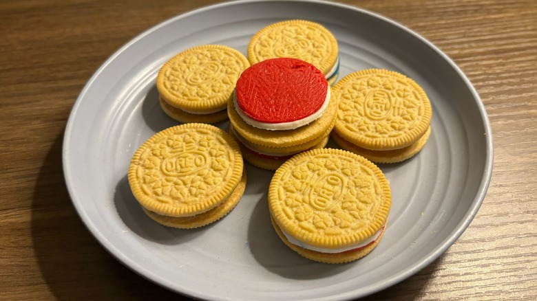 Oreo Firecracker Pop Cookies arranged on blue plate
