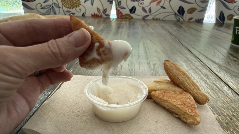 Panera Cinnamon Croissant Bite dipped in icing