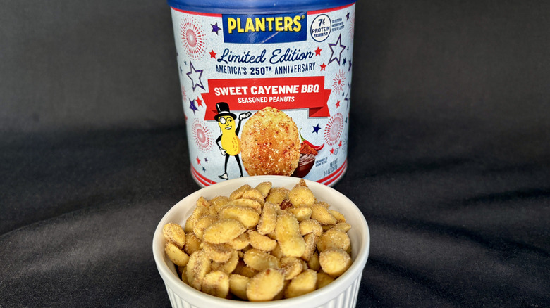 Planters Sweet Cayenne BBQ Seasoned Peanuts can behind dish of nuts