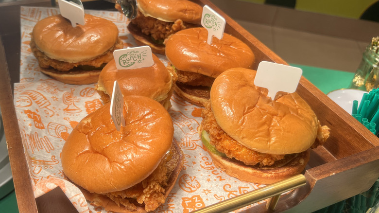a plate of Popeyes' Pickle Glaze Sandwiches