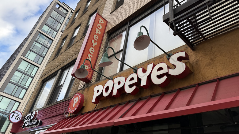 a Popeyes restaurant exterior with signage