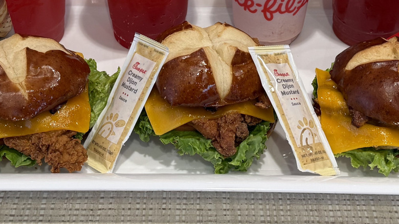 Packets of Creamy Dijon Mustard with Pretzel Cheddar Club Chicken Sandwiches
