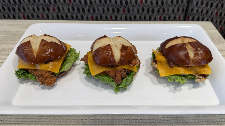 Three versions of the Chick-fil-A Pretzel Cheddar Club Chicken Sandwich