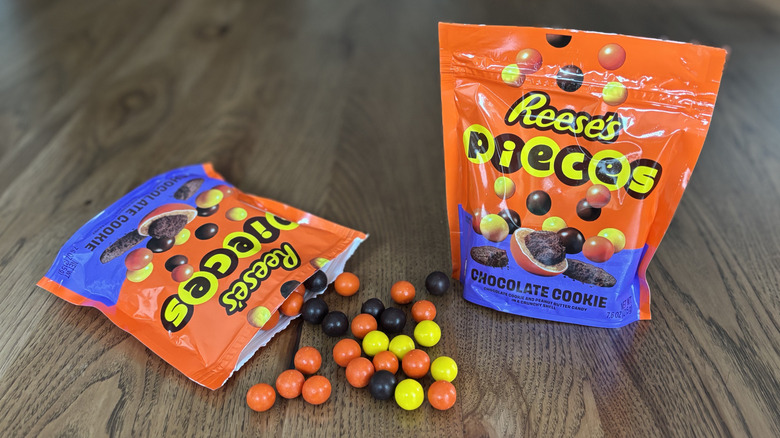Reese's Pieces with Chocolate Cookie bags with candy spill on table