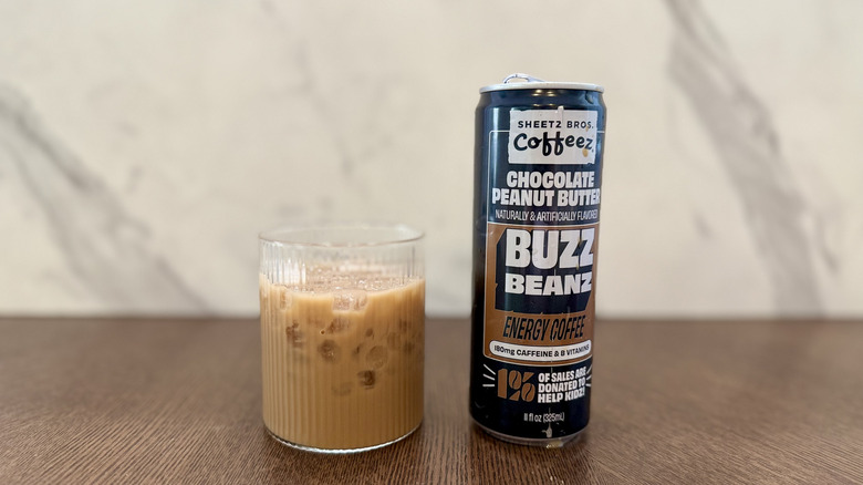 Sheetz Buzz Beanz Chocolate Peanut Butter in a glass with the can