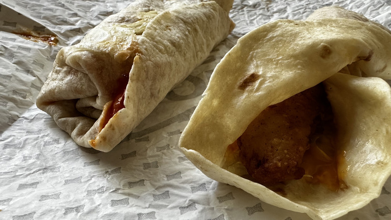Sonic Crispy Tender Wraps oozing sauce on foil wrapper