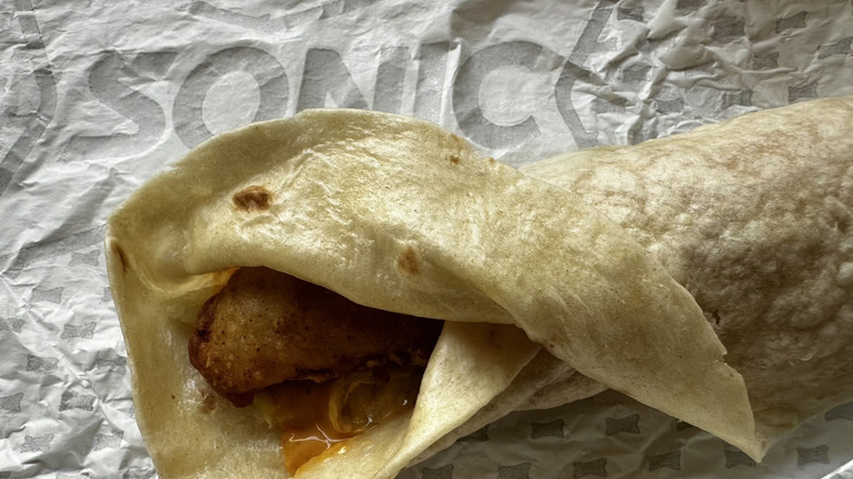 Sonic Cheesy Baja Crispy Tender Wrap on foil wrapper