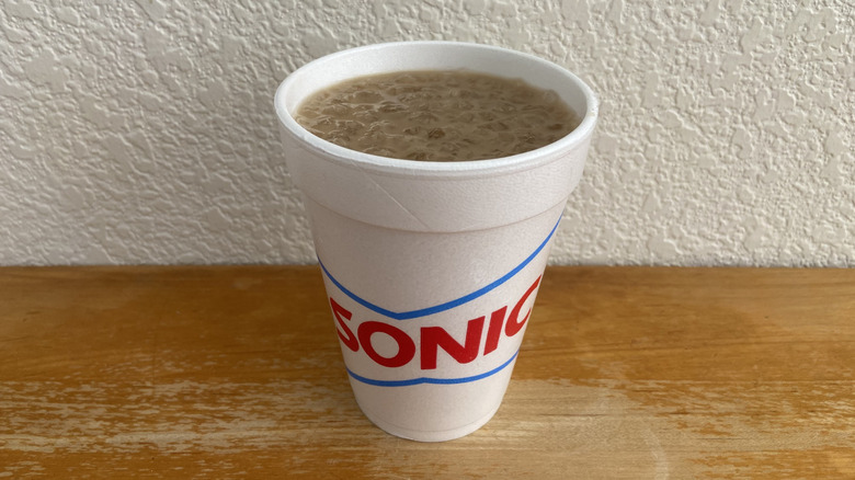 Banana Dirty Dr Pepper on wooden table