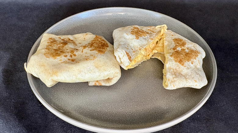 two crunchwrap sliders on plate