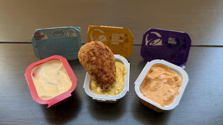 a dipped Taco Bell's Crispy Chicken Nugget