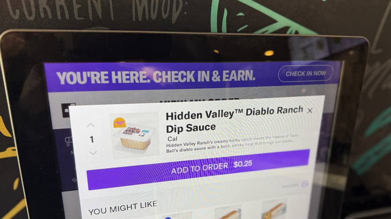 Taco Bell ordering kiosk with Hidden Valley Diablo Ranch Sauce selected