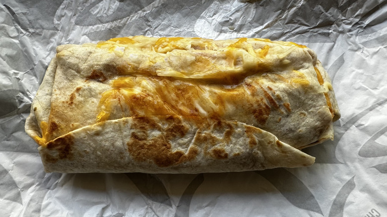 Taco Bell Flamin' Hot Grilled Cheese Burrito on wrapper