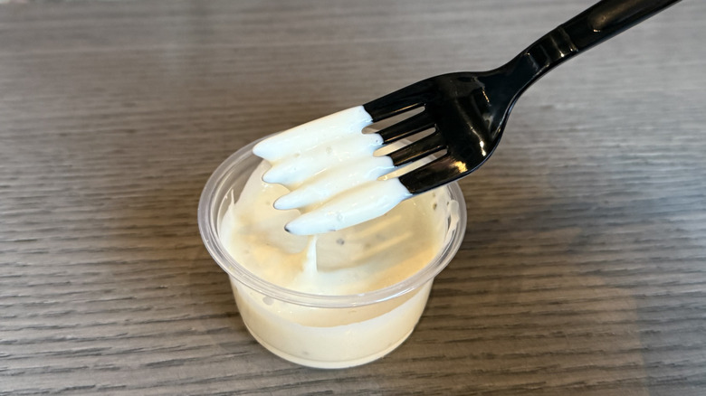 a fork full of Creamy Garlic Sauce