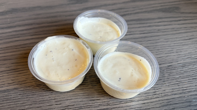 three cups of Creamy Garlic Sauce