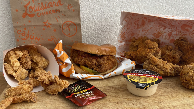 every Popeyes Hot Ones item on a cutting board