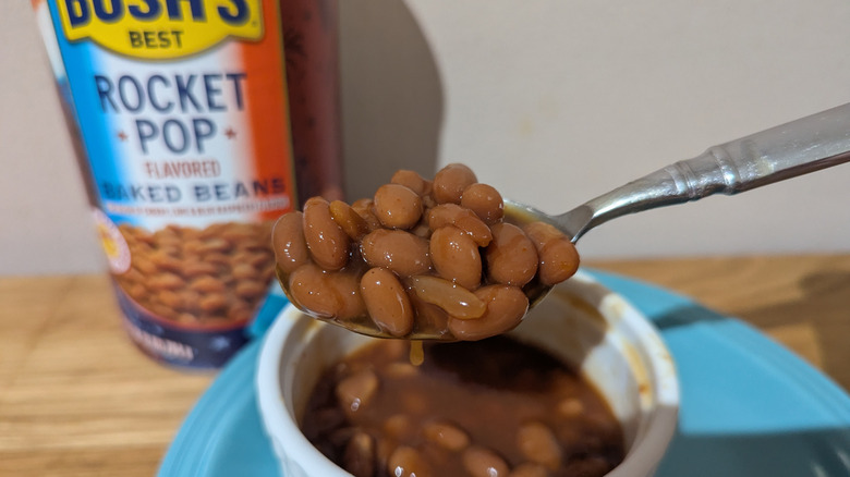 Bush's Best Rocket Pop beans on a spoon with the can in the background
