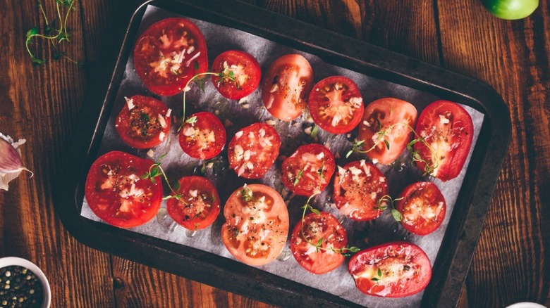 Roasted tomatoes on a baking sheet