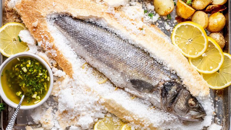 A salt-baked fish with the crust removed