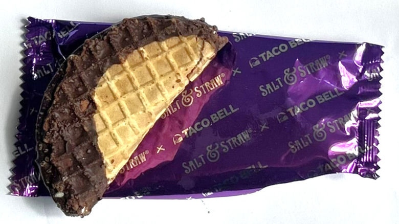 A Churro Ice Cream Taco on a plain white background, whole