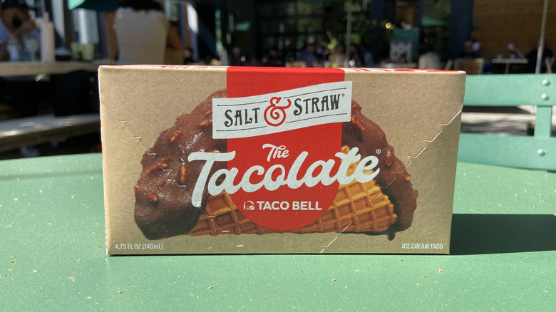 Tacolate box on green outdoor table