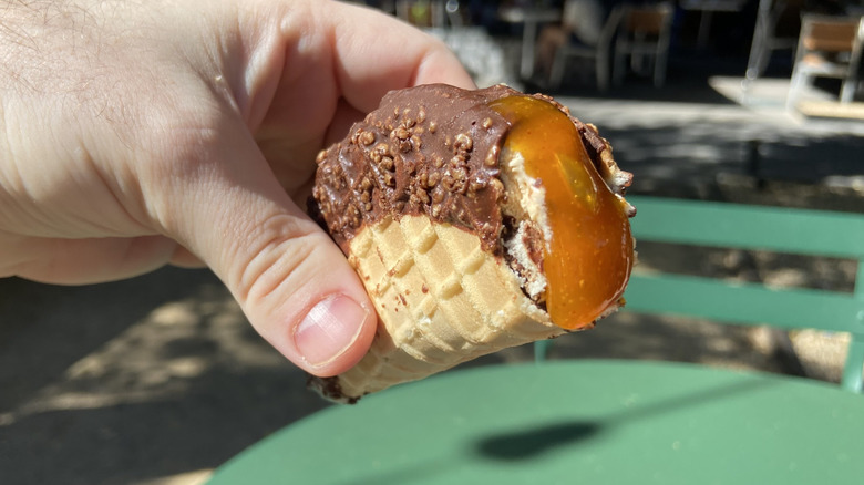 Bitten into Tacolate with mango jalapeño sauce