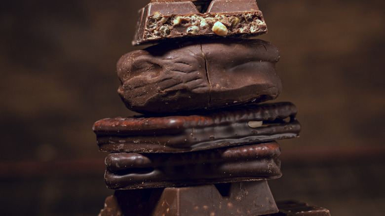 Different types of chocolates stacked in a pile