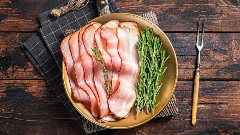 Slices of black forest ham on a plate