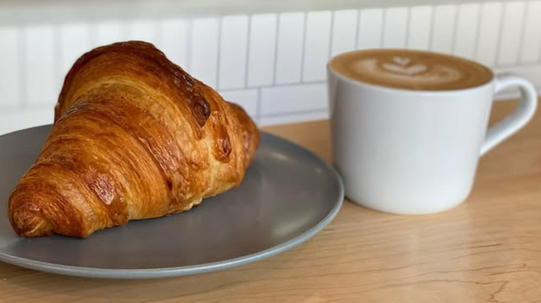 Arsicault bakery croissant and latte
