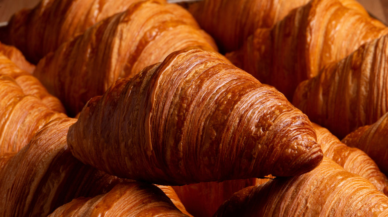 A closeup of golden-brown croissants