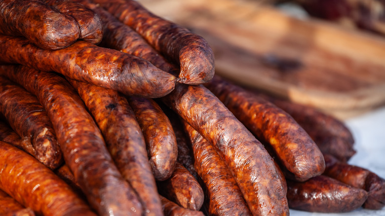 Stack of smoked sausages