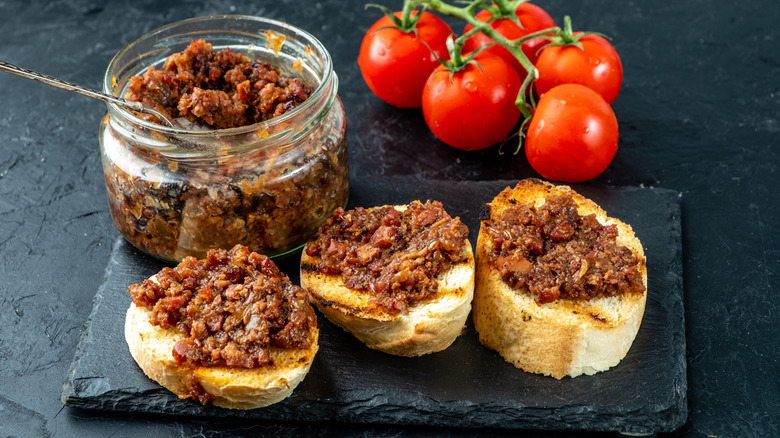 Bacon jam on bread with jar