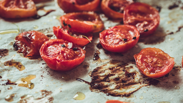 Roasted tomatoes on parchment paper