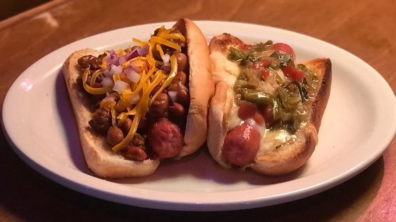 smothered hot dogs on plate