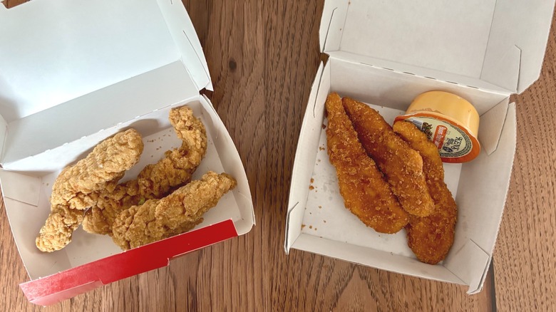 fried chicken strips in takeout box on left from Sheetz; chicken strips with sauce container in takeout box from Wawa on right