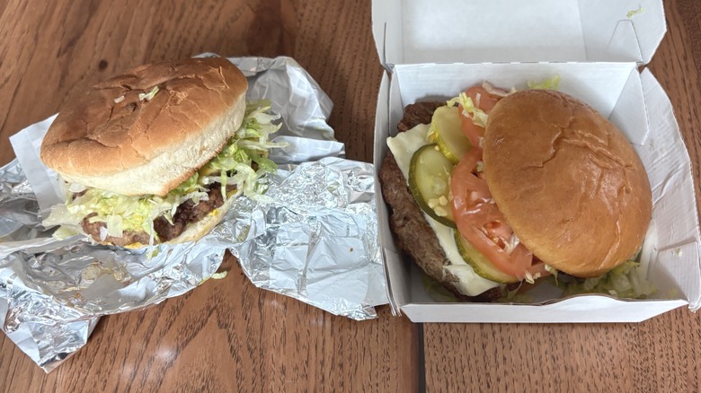 Sheetz burger in wrapper on the left; Wawa burger in box on the right