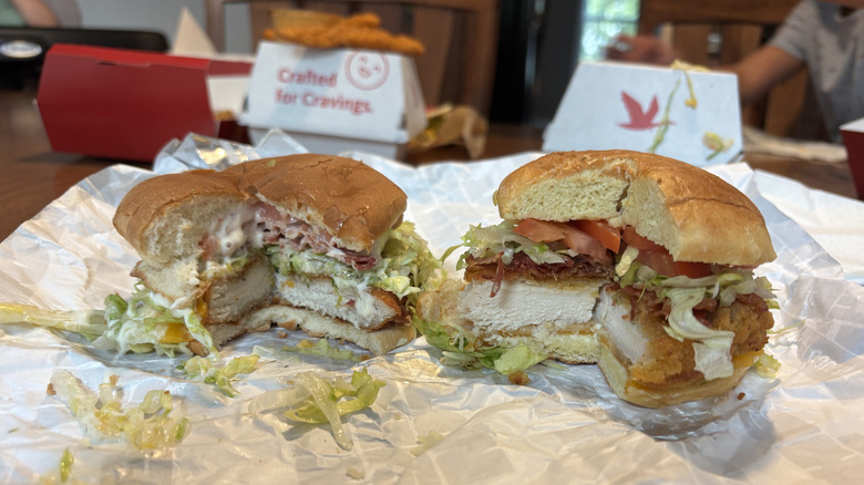 Sheetz chicken sandwich on the left; Wawa chicken sandwich with plentiful tomatoes on right