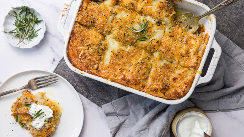 Shepherd's pie with slice taken out onto a plate