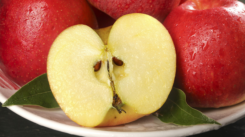 cut-open apple showing seeds
