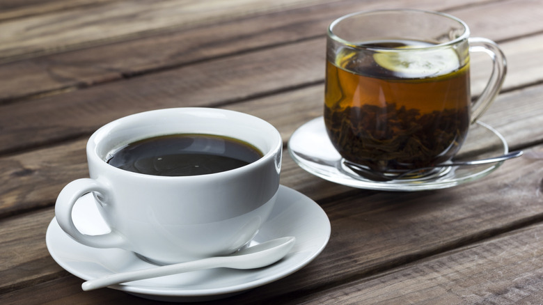 coffee in white cup and tea in clear cup
