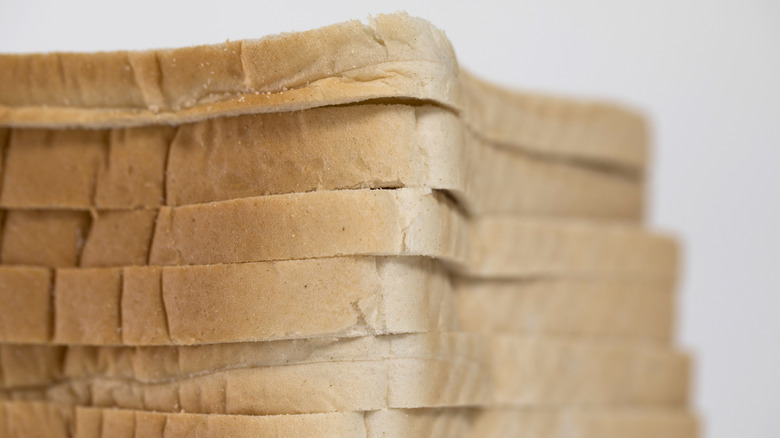 Close up of a stack of white bread